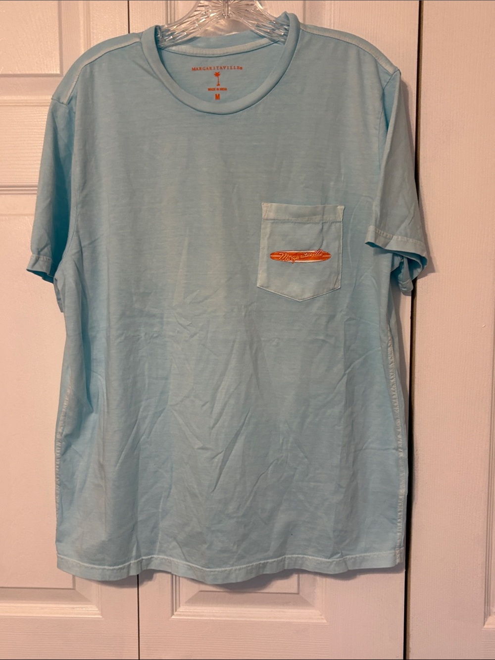 Margaritaville Sky Blue Short Sleeve Pocket Tee with Surf Logo. Medium